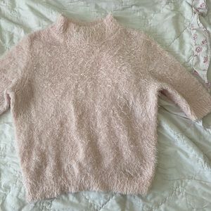 fuzzy pink sweater